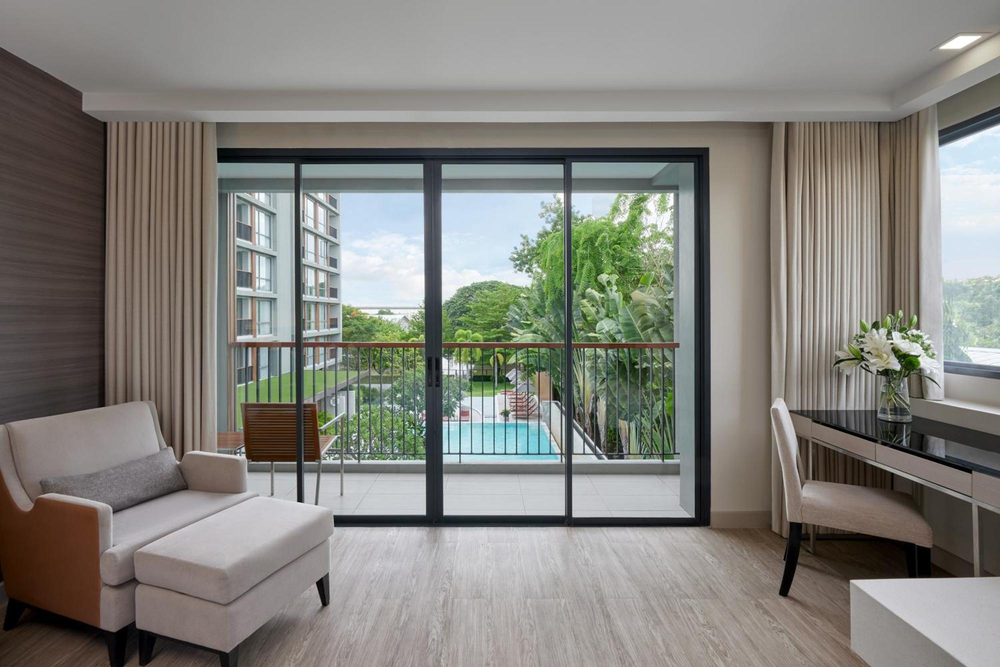 The Park Nine Hotel Suvarnabhumi Бангкок Номер фото A living room with a sliding door